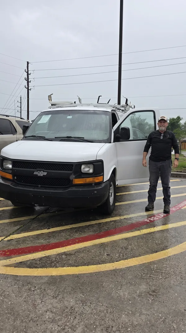 Pick & Ride Auto Sales customer with their new vehicle