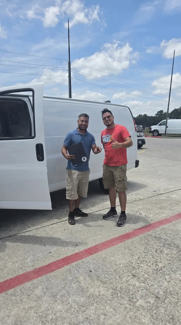 Pick & Ride Auto Sales customer with their new vehicle