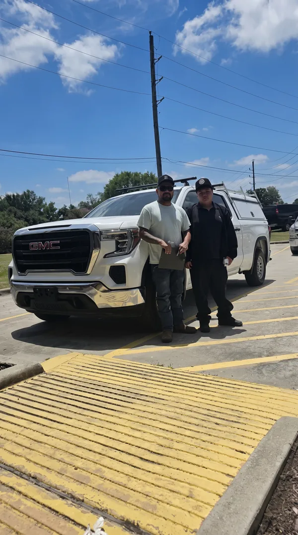 Pick & Ride Auto Sales customer with their new vehicle