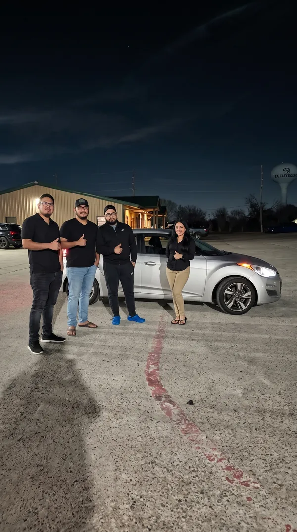 Pick & Ride Auto Sales customer with their new vehicle